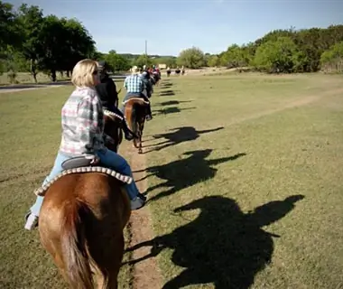 family horseback riding at Mayan Dude Ranch, Bandera, TX