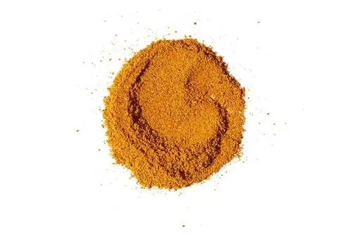 Куча Mekko Spice Rub от Essie Spice, сфотографированная на белом фоне