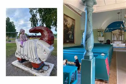 Малыш сидит на Фалуне, гигантские нарисованные козы и пьют чаепитие позади церкви.