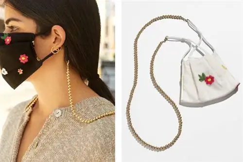 Женщина в маске с цепочкой