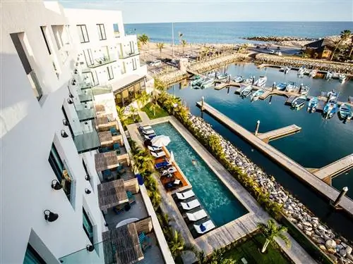 Это изображение может содержать док-порт и пирс Marina Waterfront.