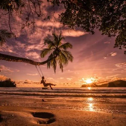 качели пляж Гавайи закат