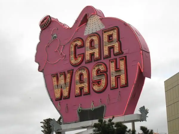 Знак автомойки слонов