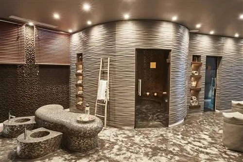 Спа-отдых на Ибице - роскошные спа-услуги на курорте 7Pines. Комната оформлена в приглушенных бежевых тонах, есть гранитные шезлонги и сауна. Спа-отдых на Ибице - роскошные спа-услуги на курорте 7Pines. Комната оформлена в приглушенных бежевых тонах, есть гранитные шезлонги и сауна.