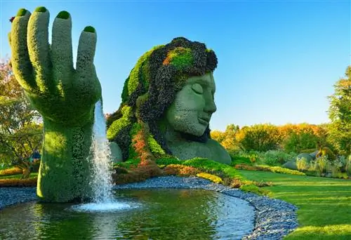 Бюст женщины, покрытый растениями, в Монреальском ботаническом саду.