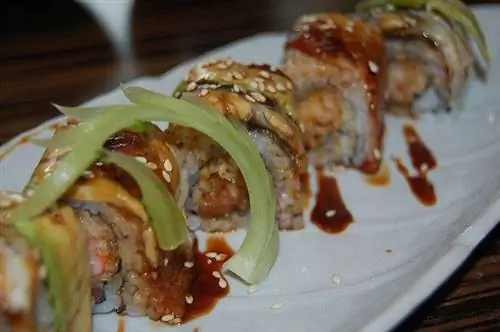 Умай-Я возле башен-близнецов Петронас