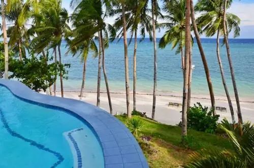 Пейзажный бассейн в курортном отеле Anda White Beach