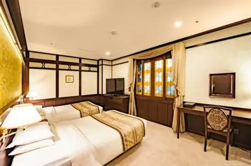 Отель Kanazawa Hakuchoro Санраку