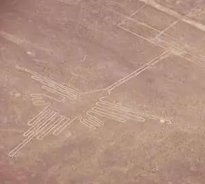 Колибри, одному из серии петроглифов в пустыне Наска в Перу, которому, как полагают, более двух тысяч лет. Фото Кэсси Сильва