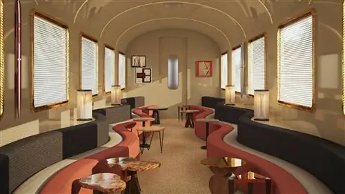 Вагон-кафе с изогнутыми сиденьями ночного поезда Orient Express La Dolce Vita.