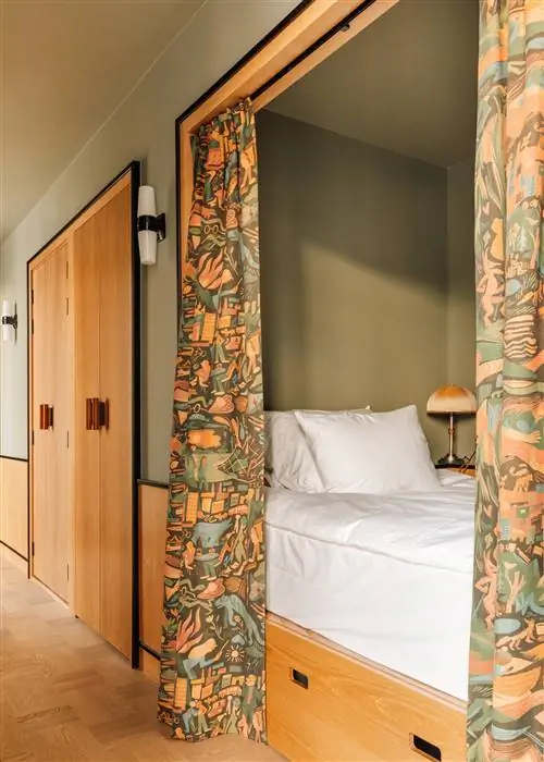Кровать в номере Sommerro Oslo's Loft