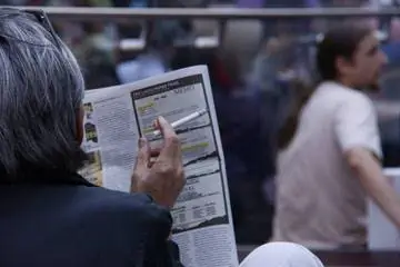 Курильщик на Таймс-сквер, Нью-Йорк