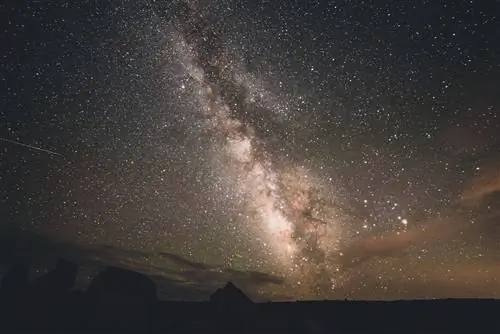 Галактика Млечный Путь и звезды из Черного каньона национального парка Ганнисон, Колорадо