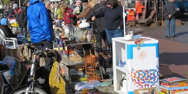 В какое время проводится гаражная распродажа REI?